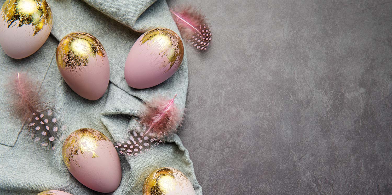 Colorful eggs on grey background